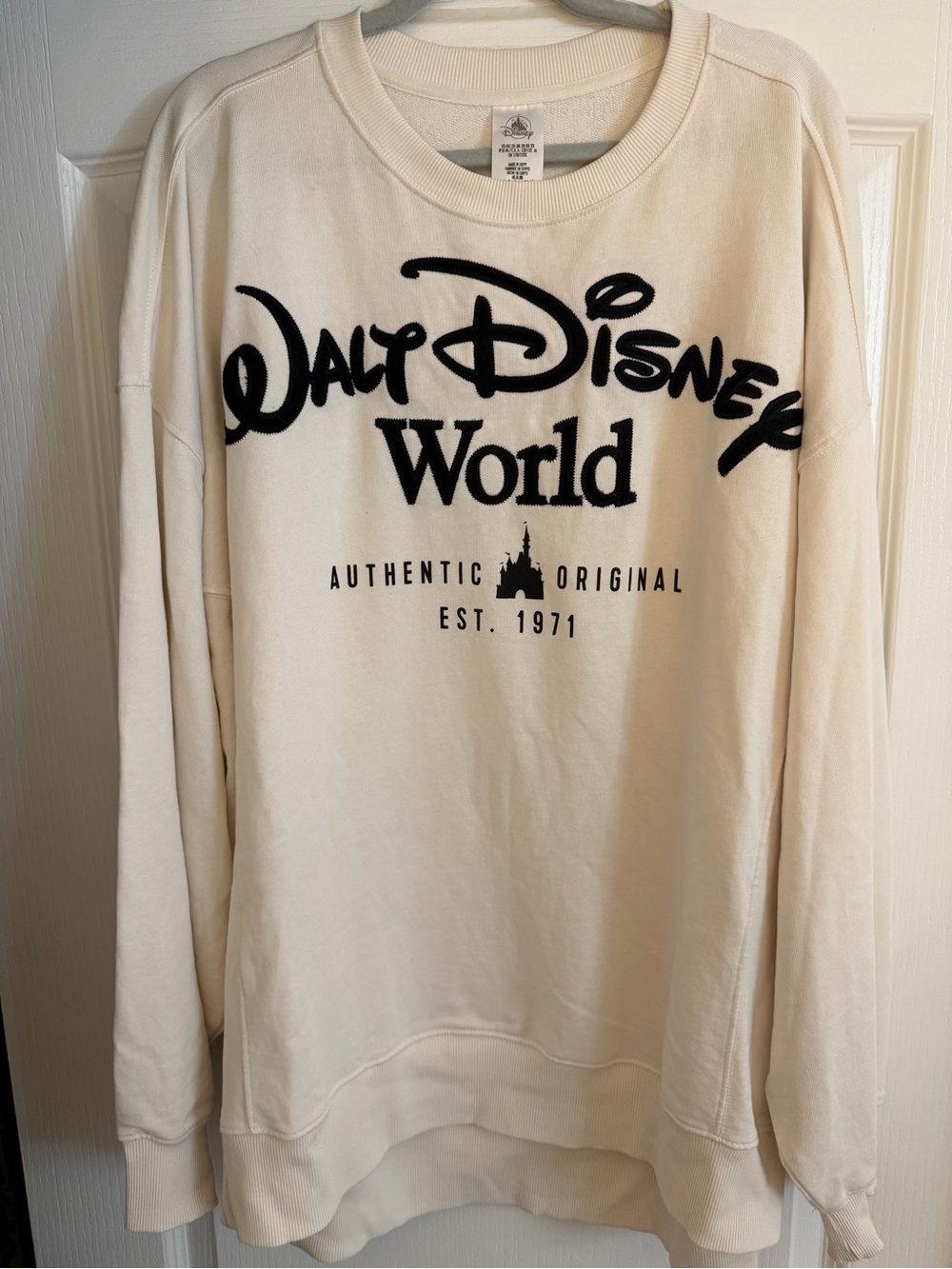 Disney Women’s Cream Crewneck Sweatshirt
